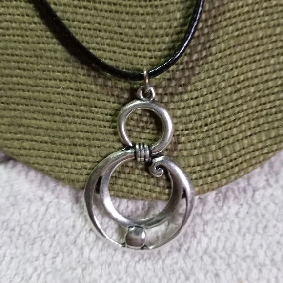 Silvertone swirl necklace on black cord - Picture 5 of 5